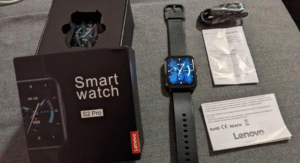 Lenovo S2 Pro smartwatch with box, charger, and manuals on table