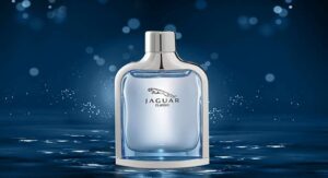 Jaguar Classic perfume bottle with silver accents on a sparkling blue background