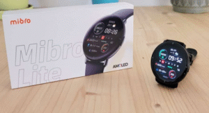 Mibro Lite smartwatch with box on wooden table