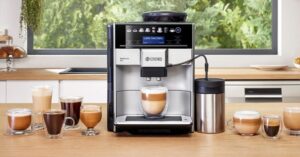 Bosch espresso machine brewing coffee surrounded by various coffee drinks on a kitchen counter.