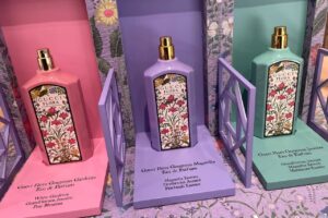 Gucci Flora perfumes in floral bottles: Gardenia, Magnolia, and Jasmine editions