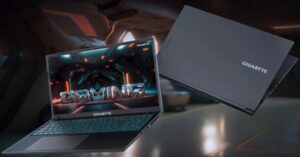 Gigabyte gaming laptop (open and closed) floating in a futuristic setting.