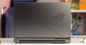 Back view of a dark grey ASUS ROG gaming laptop.