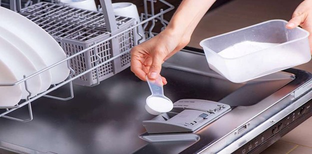 Adding dishwasher powder detergent to the detergent compartment
