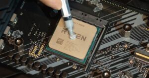 applying thermal paste on cpu to fix overheating and improve laptop performance