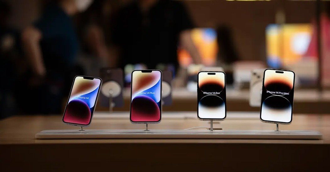 iPhone models displayed in an Apple Store
