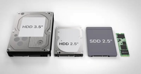 Different types and sizes of hard drives including HDD and SSD storage devices