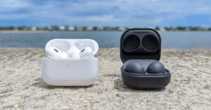 AirPods and Samsung Galaxy Buds side by side for wireless earbuds comparison