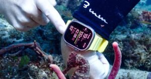 Apple Watch Ultra underwater showing dive and depth data