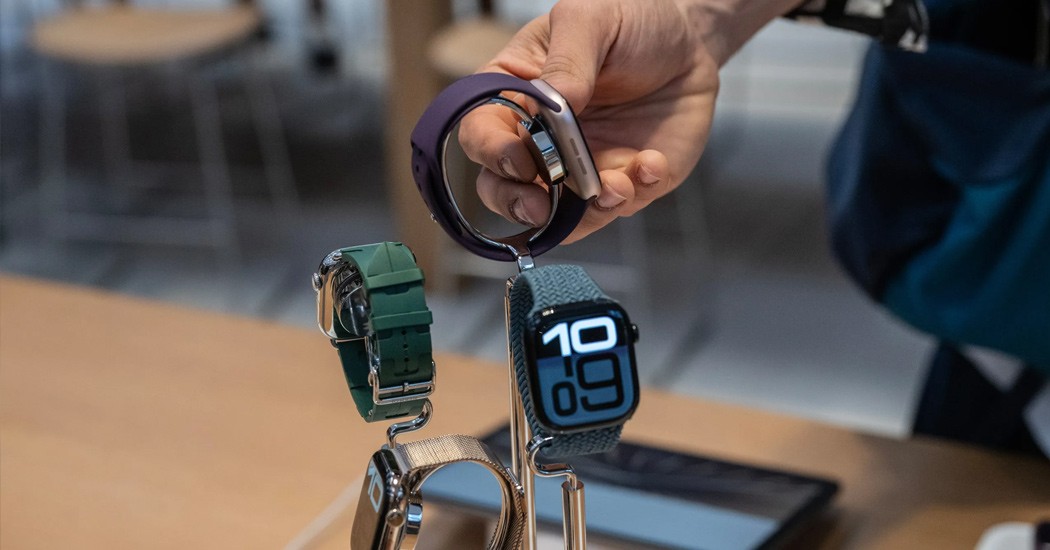 Apple Watch bands and models on display in store