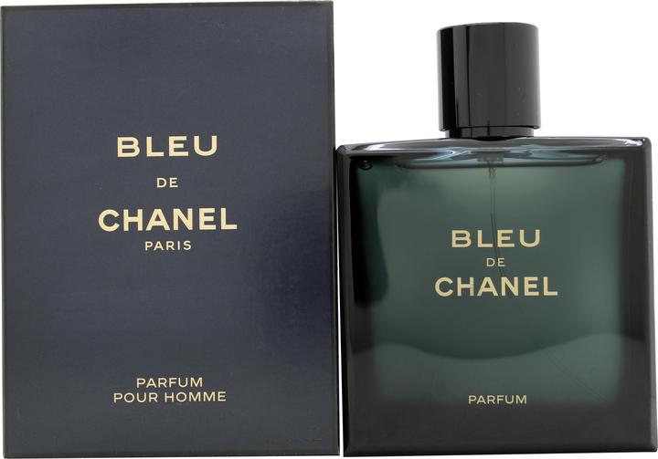 Bleu de Chanel Parfum bottle with matching dark blue packaging on a white background. 