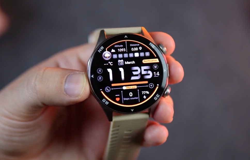 Round smartwatch held in hand with outdoor activity display and beige strap 