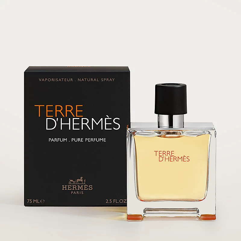 Terre d’Hermès Parfum bottle and box with woody citrus fragrance for elegant everyday wear. 