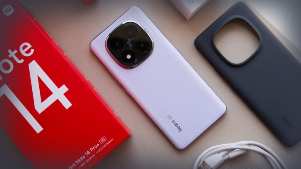 Redmi Note 14 Pro smartphone with retail box, protective case, and charging cable, showcasing the rear camera module and included accessories.