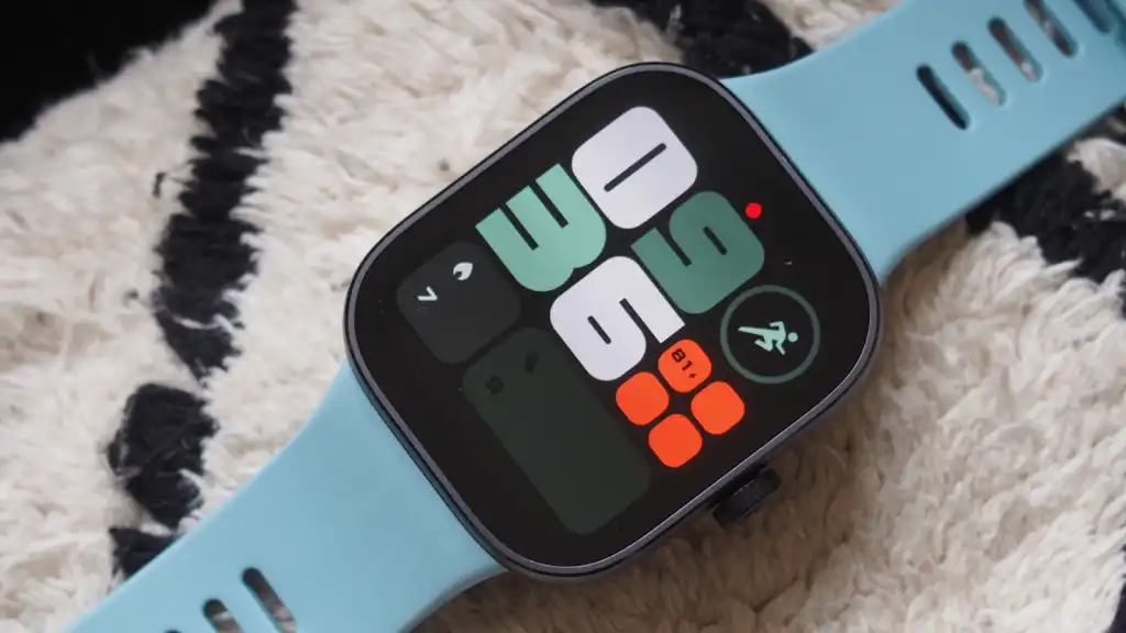 Light blue rectangular smartwatch with colorful digital display