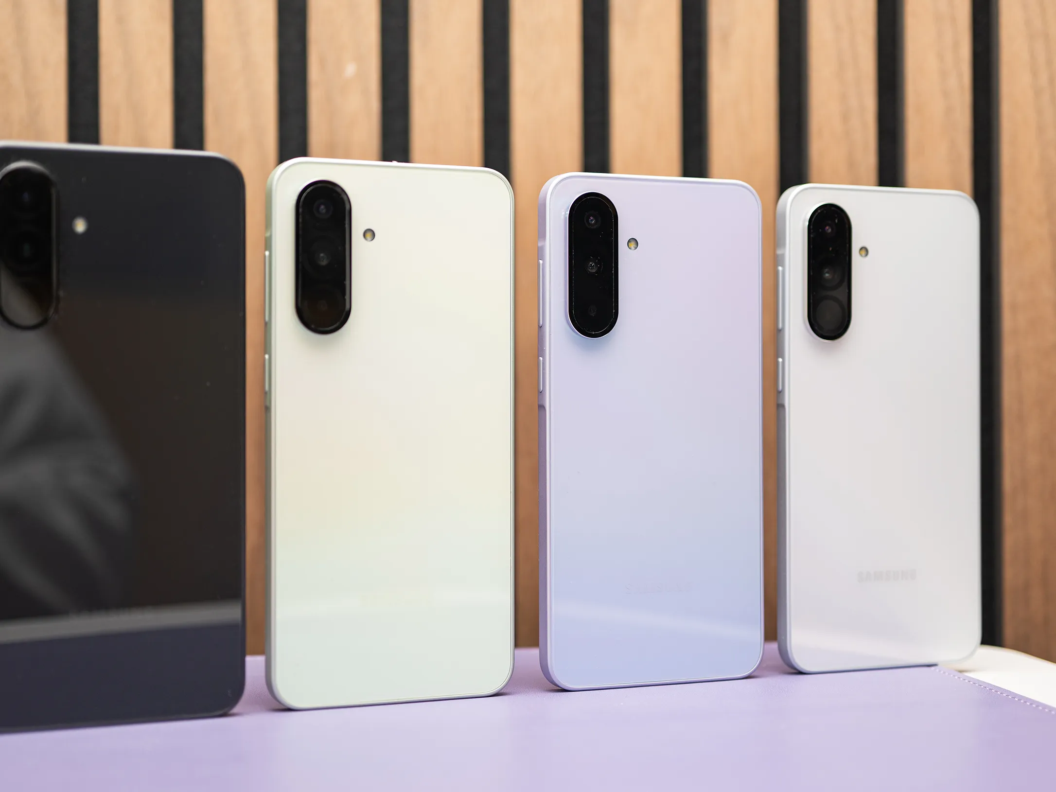 Samsung Galaxy S25 series smartphones in multiple color options, showcasing the rear camera design and premium minimalist finish.