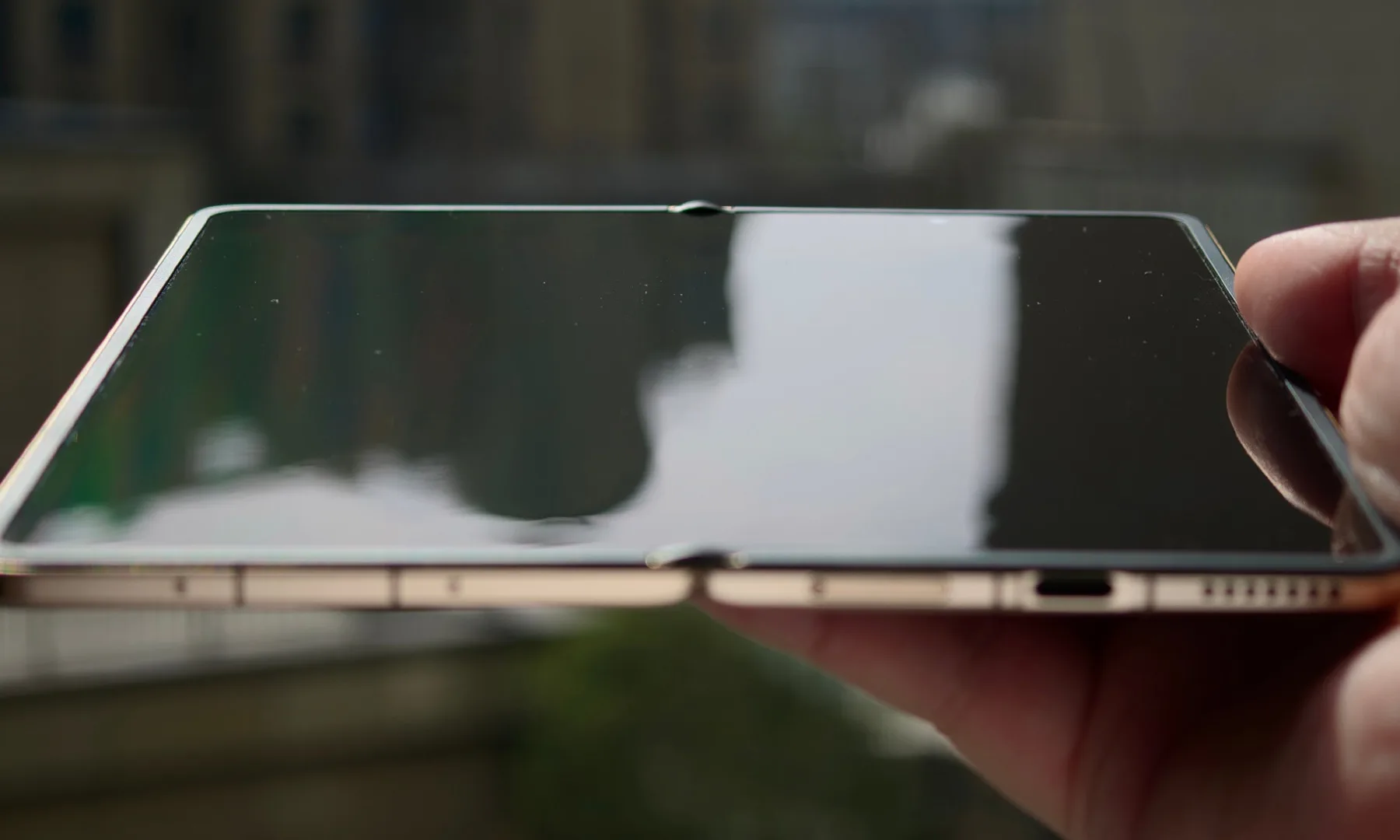Close-up of a foldable smartphone display showing the center screen crease.