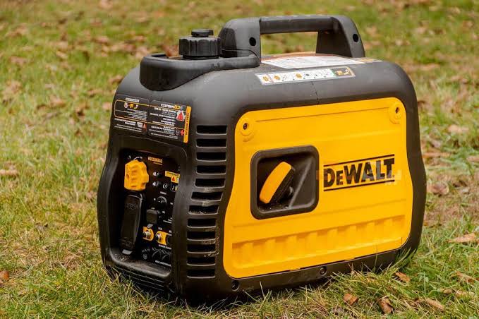 Portable inverter generator with a compact enclosed design for outdoor use
