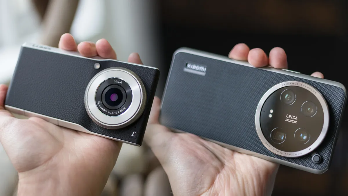Two camera-focused smartphones with large Leica-branded lenses held side by side.
