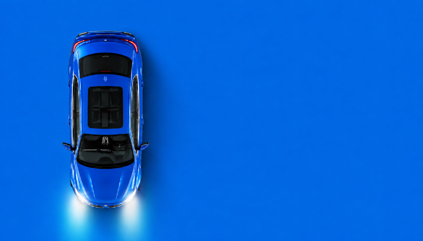 Blue BMW 320i viewed from above on a blue background