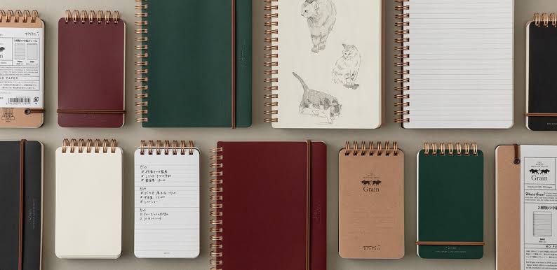 Spiral notebooks in different sizes, colors, and page styles