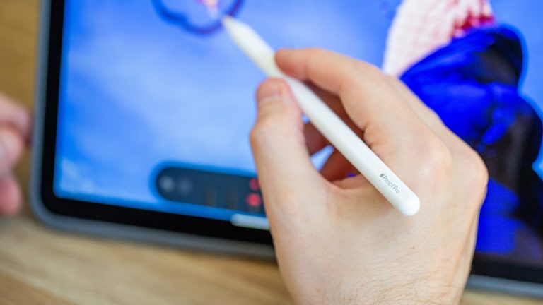 Apple Pencil being used on a tablet display