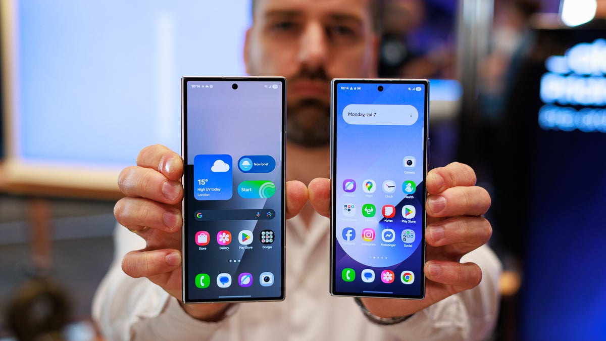 Man holding two Samsung Galaxy smartphones side by side