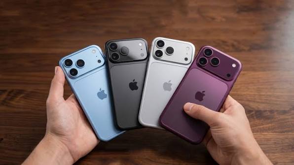 iPhone 18 Pro models in blue, black, silver, and purple held side by side
