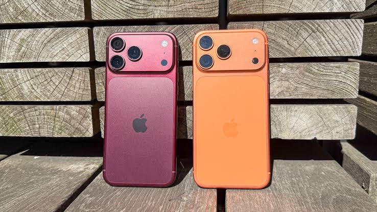 iPhone 17 and iPhone 18 models side by side in burgundy and orange colors