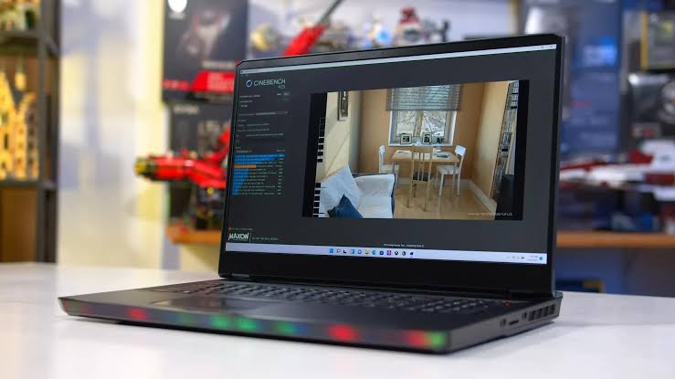 Laptop running Cinebench benchmark software to test CPU performance and system stability